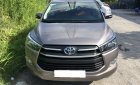 Toyota Innova 2017 - Cần tiền xài tết bán xe Innova 2017, số sàn, màu xám