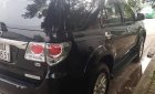 Toyota Fortuner 2014 - Cần bán gấp Toyota Fortuner đời 2014, màu đen chính chủ, giá 745tr