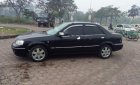 Ford Laser Ghia 2004 - Bán Ford Laser Ghia 2004, màu đen như mới, giá tốt