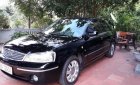 Ford Laser GHIA 1.8 AT 2005 - Cần bán lại xe cũ Ford Laser GHIA 1.8 AT đời 2005, màu đen  