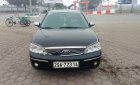 Ford Laser 2004 - Cần bán gấp Ford Laser sản xuất 2004, màu đen xe gia đình, giá chỉ 160 triệu