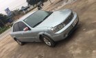 Ford Laser LXi 1.6 MT 2004 - Cần bán lại xe Ford Laser LXi 1.6 MT năm 2004, màu bạc chính chủ 