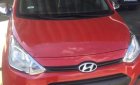 Hyundai Grand i10   2014 - Gia đình bán xe Hyundai Grand i10 sản xuất năm 2014, màu đỏ