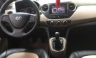 Hyundai Grand i10 1.0MT 2015 - Cần bán lại xe Hyundai Grand i10 1.0MT đời 2015, màu bạc, xe còn mới và nguyên bản toàn bộ