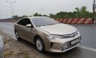 Toyota Camry 2.0E 2016 - Bán xe Camry 2.0E sản xuất năm 2016, số tự động, máy xăng, màu vàng cát, nội thất màu kem, đã đi 45000 km