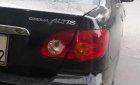 Toyota Corolla altis 1.8G MT 2003 - Bán Toyota Corolla altis 1.8G MT năm sản xuất 2003, màu đen 