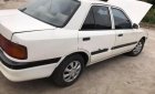 Mazda 323 1.6 MT 1995 - Cần bán Mazda 323 1.6 MT năm 1995, màu trắng, 46tr