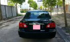Toyota Corolla altis G 2004 - Cần bán Toyota Corolla altis G 2004, màu đen, giá 290tr