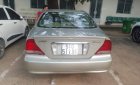 Daewoo Magnus 2004 - Cần bán gấp Daewoo Magnus đời 2004, màu bạc, nhập khẩu