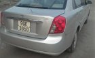 Daewoo Lacetti SE 2004 - Cần bán gấp Daewoo Lacetti SE sản xuất năm 2004, màu bạc