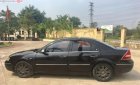 Ford Mondeo 2.5 AT 2004 - Gia đình bán Ford Mondeo 2.5 AT sản xuất năm 2004, màu đen, giá chỉ 210 triệu