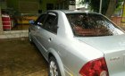 Ford Laser GHIA 1.8 AT 2004 - Bán Ford Laser GHIA 1.8 AT đời 2004, màu bạc, xe đẹp 