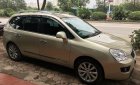 Kia Carens SX 2.0 AT  2013 - Bán xe Kia Carens SX đời 2014 số tự động, màu vàng biển Hà Nội