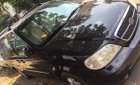 Kia Carnival   2007 - Bán Kia Carnival đời 2007, màu đen, nhập khẩu nguyên chiếc, số sàn