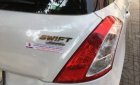 Suzuki Swift AT  2015 - Cần bán gấp Suzuki Swift AT sản xuất năm 2015, màu trắng số tự động