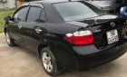 Toyota Vios 1.6 2004 - Bán Toyota Vios 1.6 sản xuất 2004, màu đen, xe gia đình