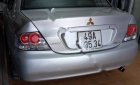 Mitsubishi Lancer 2004 - Cần bán lại xe Mitsubishi Lancer 2004, màu bạc số tự động, giá tốt