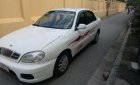 Daewoo Lanos SX 2004 - Gia đình cần bán Daewoo Lanos SX đời 2004, màu trắng, giá 72tr