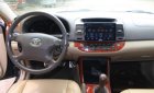 Toyota Camry 2.4 G 2004 - Cần bán xe Toyota Camry 2.4 G đời 2004, màu đen, số sàn