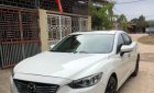 Mazda 6 2.0 AT 2015 - Cần bán lại xe Mazda 6 2.0 AT năm sản xuất 2015, màu trắng