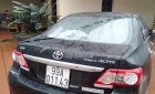 Toyota Corolla altis 2011 - Cần bán gấp Toyota Corolla Altis đời 2011, màu đen chính chủ, giá tốt