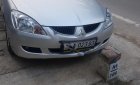 Mitsubishi Lancer 2004 - Cần bán xe Mitsubishi Lancer đời 2004, màu bạc, xe đi ít giữ gìn cẩn thận