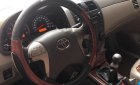 Toyota Corolla altis 1.8G MT 2009 - Bán xe Toyota Corolla Altis 1.8G sx 2009, số tay, máy xăng, màu đen, nội thất màu kem, đã đi 154000 km