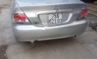 Mitsubishi Lancer 2004 - Cần bán xe Mitsubishi Lancer đời 2004, màu bạc, xe đi ít giữ gìn cẩn thận