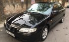 Mazda 626 2.0 MT 2003 - Bán Mazda 626 bản đủ nhất sx 2003, số tay, máy xăng, màu đen, hai túi khí phanh ABS