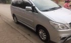 Toyota Innova  E 2014 - Cần bán Toyota Innova đời 2014, màu bạc xe gia đình