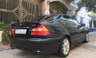 BMW 3 Series  318i   2004 - Cần bán BMW 318i sản xuất 2004, màu đen, số tự động