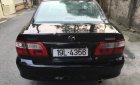 Mazda 626 2.0 MT 2003 - Bán Mazda 626 bản đủ nhất sx 2003, số tay, máy xăng, màu đen, hai túi khí phanh ABS