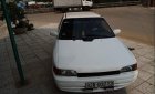 Mazda 323   1995 - Cần bán gấp Mazda 323 đời 1995, màu trắng, đèn trước sau mới thay, về chỉ việc đi