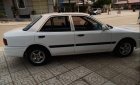 Mazda 323   1995 - Cần bán gấp Mazda 323 đời 1995, màu trắng, đèn trước sau mới thay, về chỉ việc đi