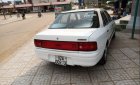 Mazda 323   1995 - Cần bán gấp Mazda 323 đời 1995, màu trắng, đèn trước sau mới thay, về chỉ việc đi