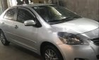 Toyota Vios  E 2013 - Bán Toyota Vios E năm 2013, màu bạc xe gia đình, giá 345 triệu