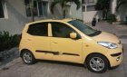 Hyundai i10   2010 - Bán ô tô Hyundai i10 đời 2010, màu vàng, đi được khoảng 86.000km