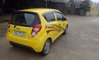 Chevrolet Spark LT 1.0 MT 2015 - Cần bán xe Chevrolet Spark LT 1.0 MT đời 2015, màu vàng 