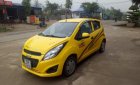 Chevrolet Spark LT 1.0 MT 2015 - Cần bán xe Chevrolet Spark LT 1.0 MT đời 2015, màu vàng 