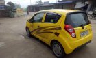 Chevrolet Spark LT 1.0 MT 2015 - Cần bán xe Chevrolet Spark LT 1.0 MT đời 2015, màu vàng 