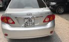 Toyota Corolla altis 1.8G MT 2009 - Bán Toyota Corolla altis 1.8G MT 2009, màu bạc như mới  