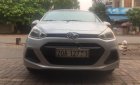 Hyundai Grand i10 1.0 MT 2015 - Cần bán gấp Hyundai Grand i10 1.0 MT năm 2015, màu bạc, nhập khẩu  