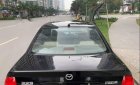 Mazda 323 2003 - Bán ô tô Mazda 323 đời 2003, màu đen xe gia đình