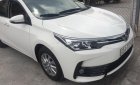 Toyota Corolla altis 1.8E 2017 - Bán xe Toyota Corolla altis 1.8E sản xuất 2017, màu trắng chính chủ, 690 triệu