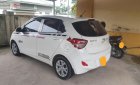 Hyundai Grand i10 2014 - Gia đình cần bán Hyundai Grand i10 2014, màu trắng, xe nhập