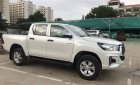 Toyota Hilux 2.4E 4x2 AT 2019 - Bán xe Toyota Hilux AT 2019, màu trắng, nhập khẩu, 695 triệu