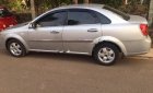 Daewoo Lacetti EX 2011 - Bán ô tô Daewoo Lacetti EX đời 2011, màu bạc