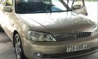 Ford Laser   2003 - Bán xe Ford Laser sản xuất năm 2003, màu vàng, giá tốt