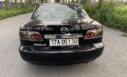 Mazda 6 2.0 MT 2003 - Cần bán gấp Mazda 6 2.0 MT đời 2003, màu đen