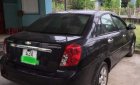 Chevrolet Lacetti 2013 - Bán xe Chevrolet Lacetti sản xuất 2013, màu đen còn mới, giá chỉ 250 triệu